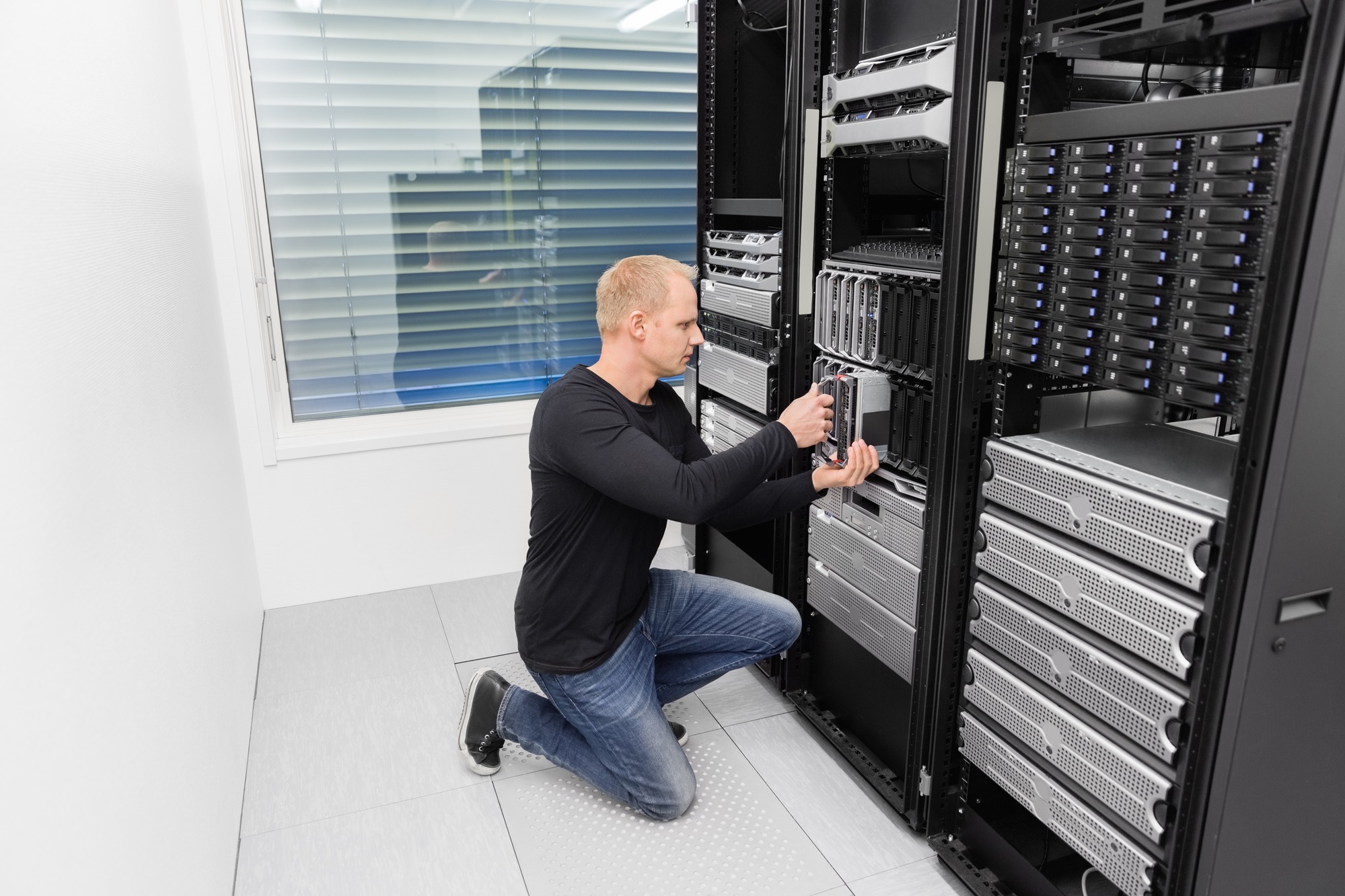 IT consultant working in datacenter